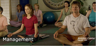 Still from the movie Management with Jennifer and Steve in a Yoga class